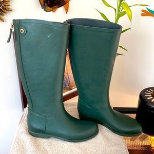 Green Hunter Rainboots size 8 with visible wear on back strap